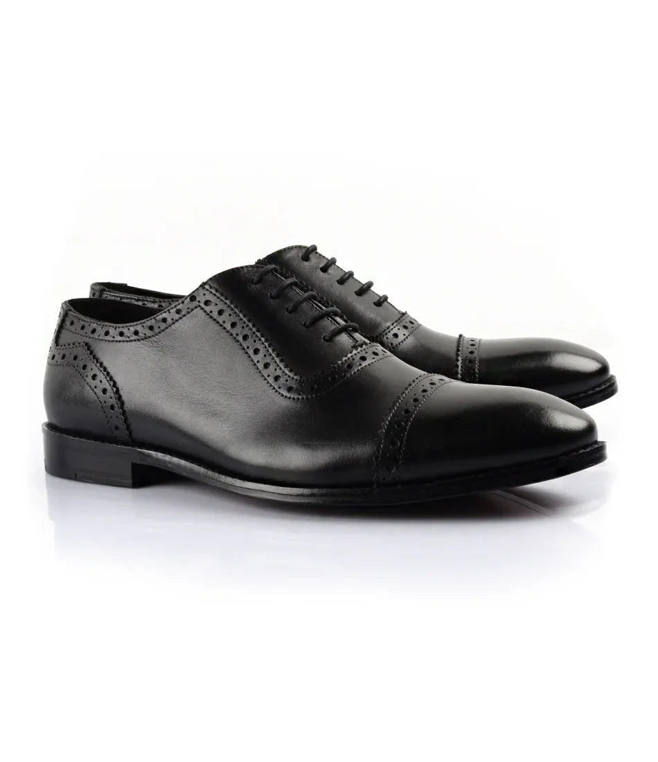 Illustration of Hand-Stitched Black Oxfords With Heritage-Inspired Detailing